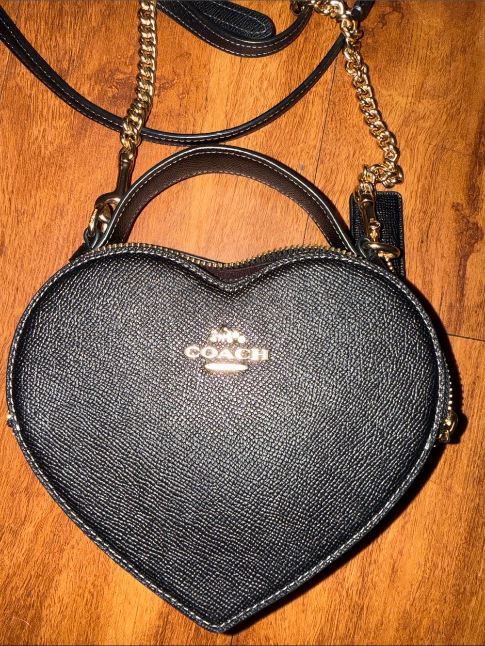 Coach Black Heart-Shaped Crossbody with Gold Hardware